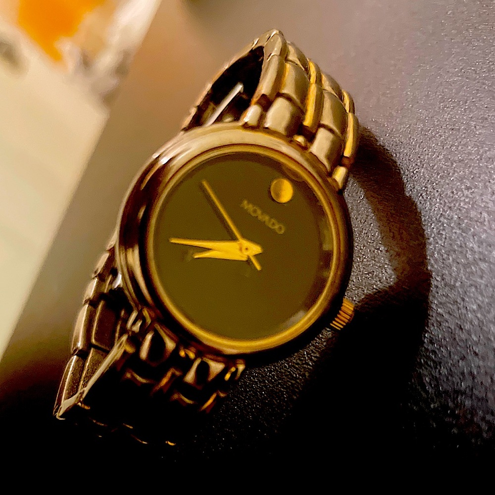 Movado 1865 Sapphire Crystal. Gold/ Stainless steel. Have box and warranty